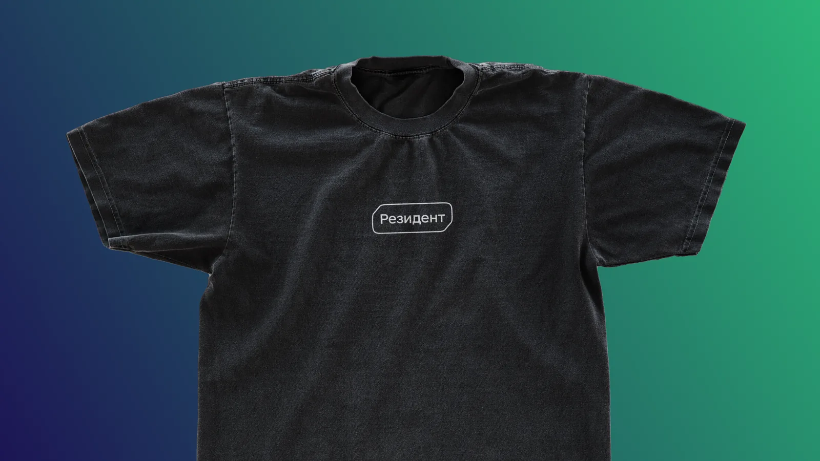 Black T-shirt with the Resident badge