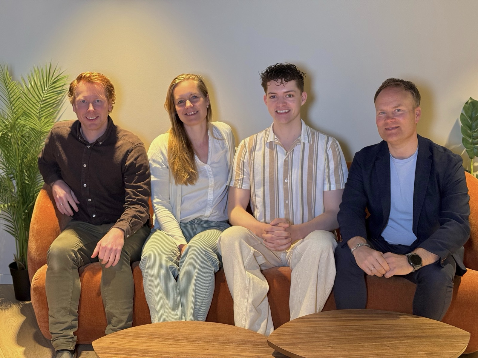 Four people seated together in the Proventus office in Oslo: the Proventus leadership team with CMO Partners